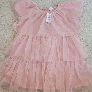 Soft pink glitter dress.